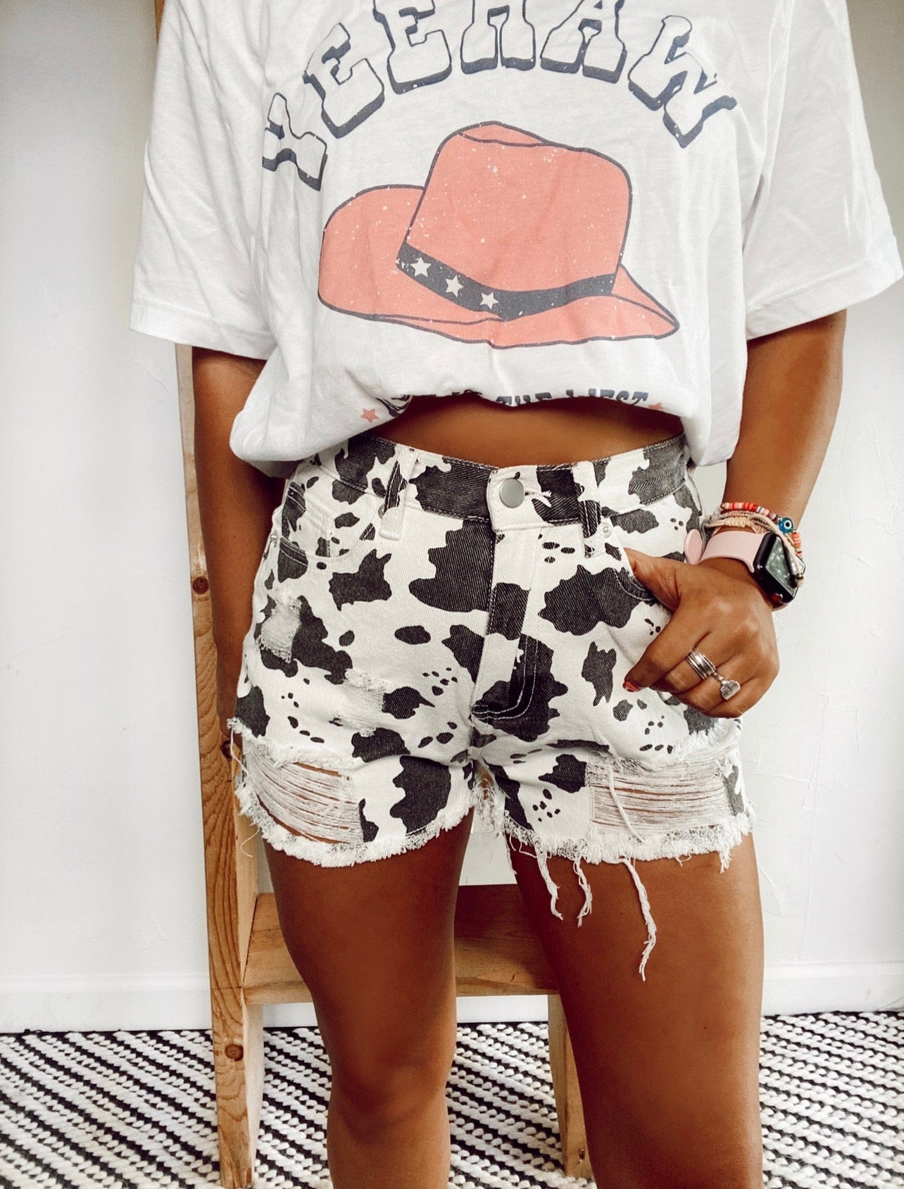 Distressed Cow Print Denim Shorts